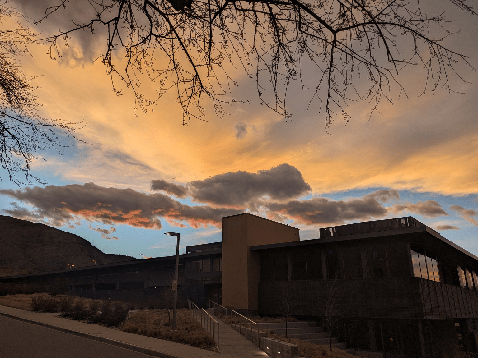 sunset over the McNeil center on the School of Mines campus